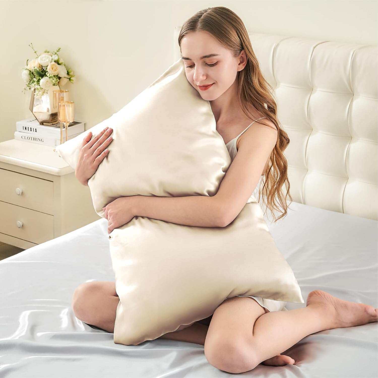 Woman embracing a luxurious champagne-colored silk pillow case, highlighting its ultra-soft and smooth texture. This silk pillow case is designed for ultimate comfort, hair protection, and a breathable, skin-friendly sleep experience.