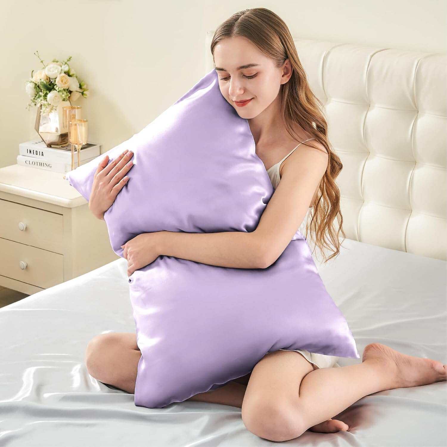Woman embracing a luxurious lavender silk pillow case, highlighting its ultra-soft and smooth texture. This silk pillow case is designed for ultimate comfort, hair protection, and a breathable, skin-friendly sleep experience.