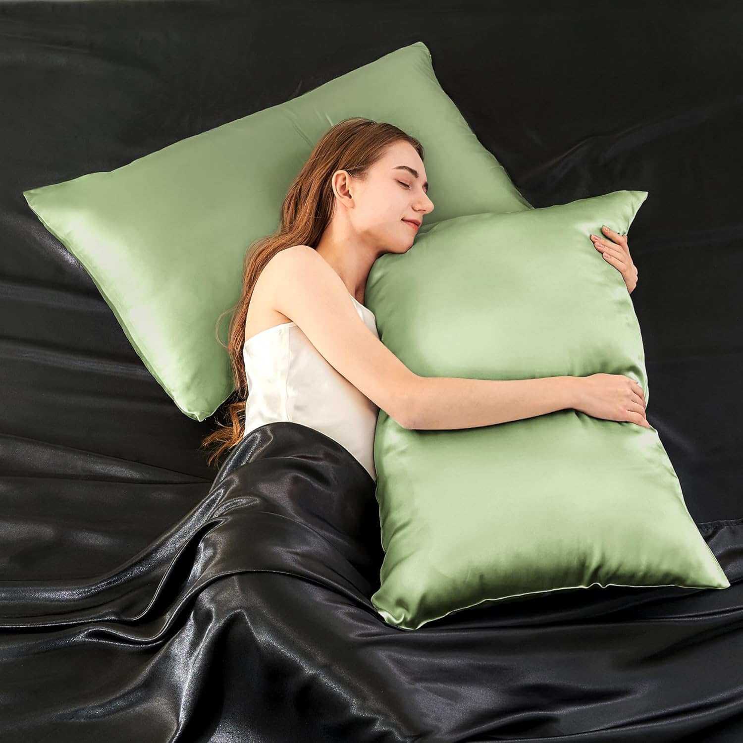 Woman resting on a luxurious light green silk pillow case, highlighting its ultra-soft and smooth texture. This silk pillow case is designed for superior comfort, hair protection, and a breathable, skin-friendly sleep experience.