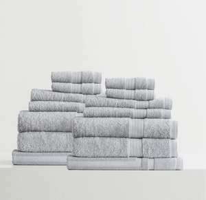 Adorearth™ organic bamboo towels in grey neatly stacked in a set.