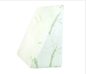 White wedge pillow with a breathable, washable cover.