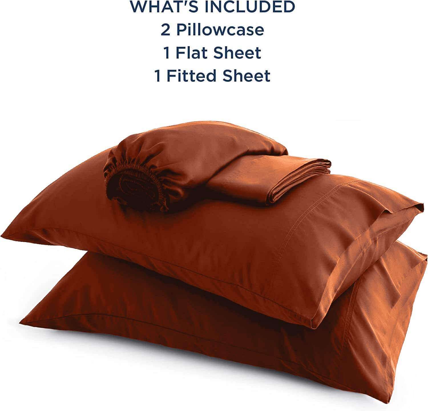 Stacked set of brown bamboo pillowcases with a soft and smooth texture, highlighting their luxurious quality. These bamboo bed sheets and pillowcases are breathable, hypoallergenic, and ultra-soft for a restful sleep experience.