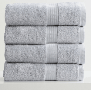 Stack of four folded Adorearth™ organic bamboo towels in light gray
