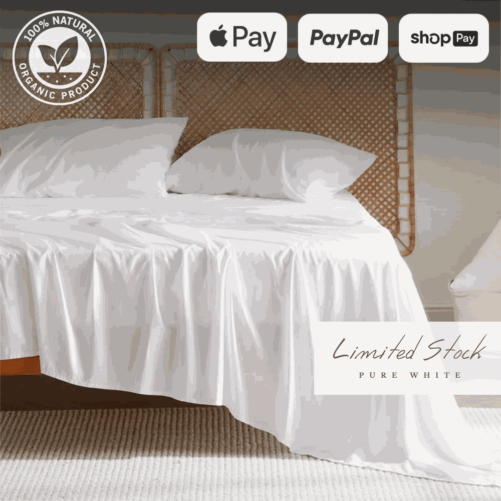 Soft and luxurious bamboo bed sheets elegantly draped over a bed, offering a breathable and hypoallergenic sleep experience. These bamboo sheets provide ultimate comfort, moisture-wicking properties, and durability for a restful night